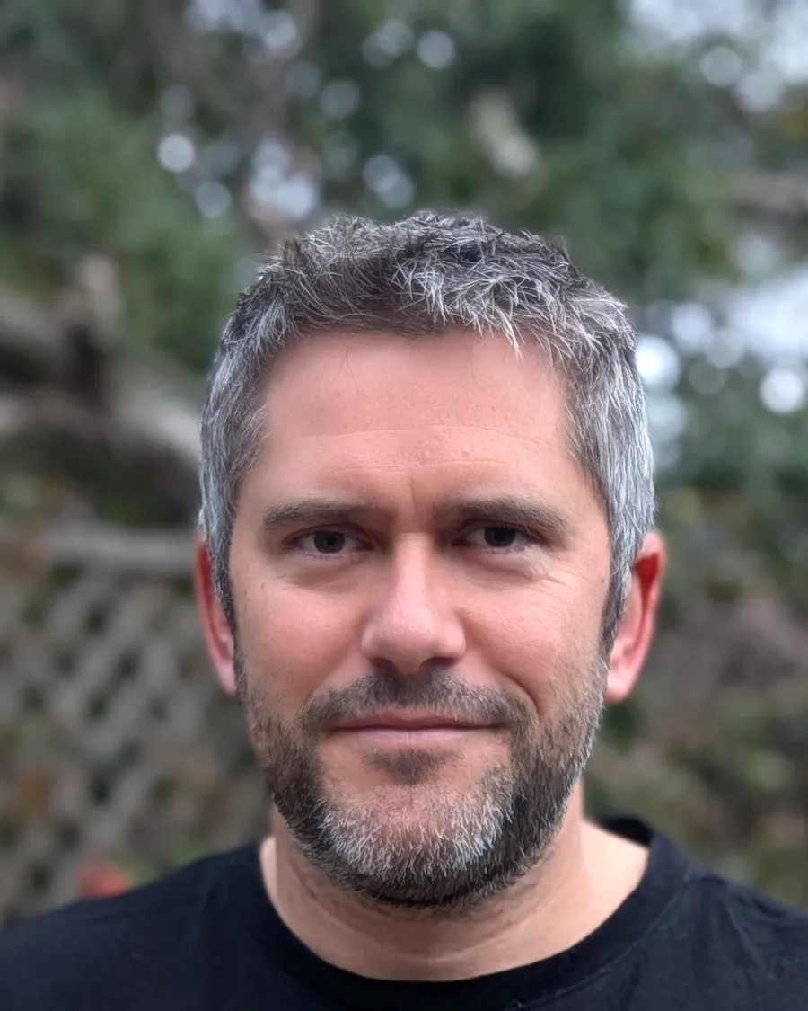 Jake Gordon, founder of RGBloom, head and shoulders, in a garden